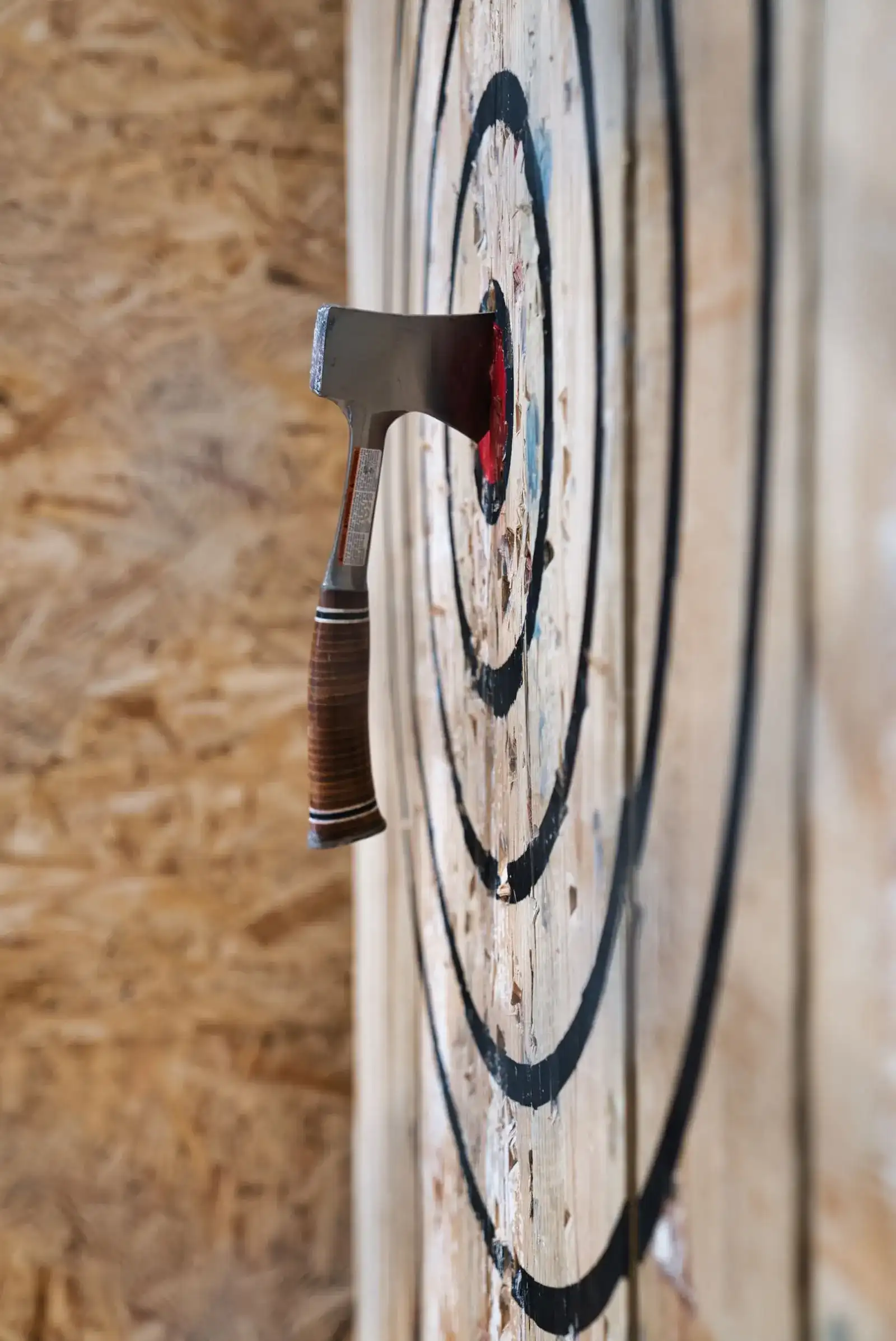 Axe stuck in the bullseye at Escape Smash Play Geelong